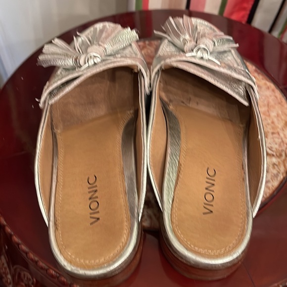 Vionic size7 woman shoe color silver with tassel. Pre owned condition great. - Picture 3 of 8
